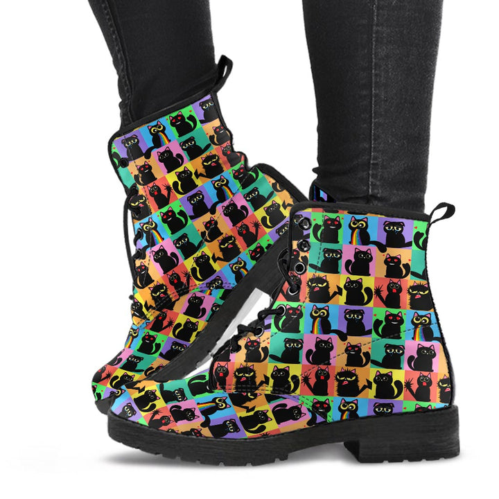 Lifestyle shot of Black Cats Classic Boots worn on feet, highlighting the playful pop art cat artwork.