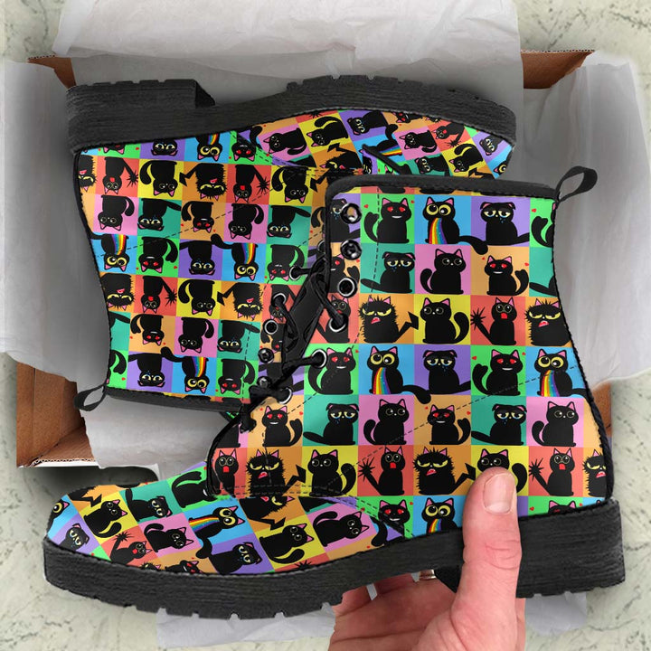 Unboxing Black Cats Classic Boots, showing the boldly colorful cat boots inside a cardboard shoe box.