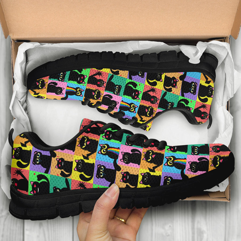 Unboxing Black Cats Classic Sneakers with black soles, showing the boldly colorful cat design inside a cardboard box.