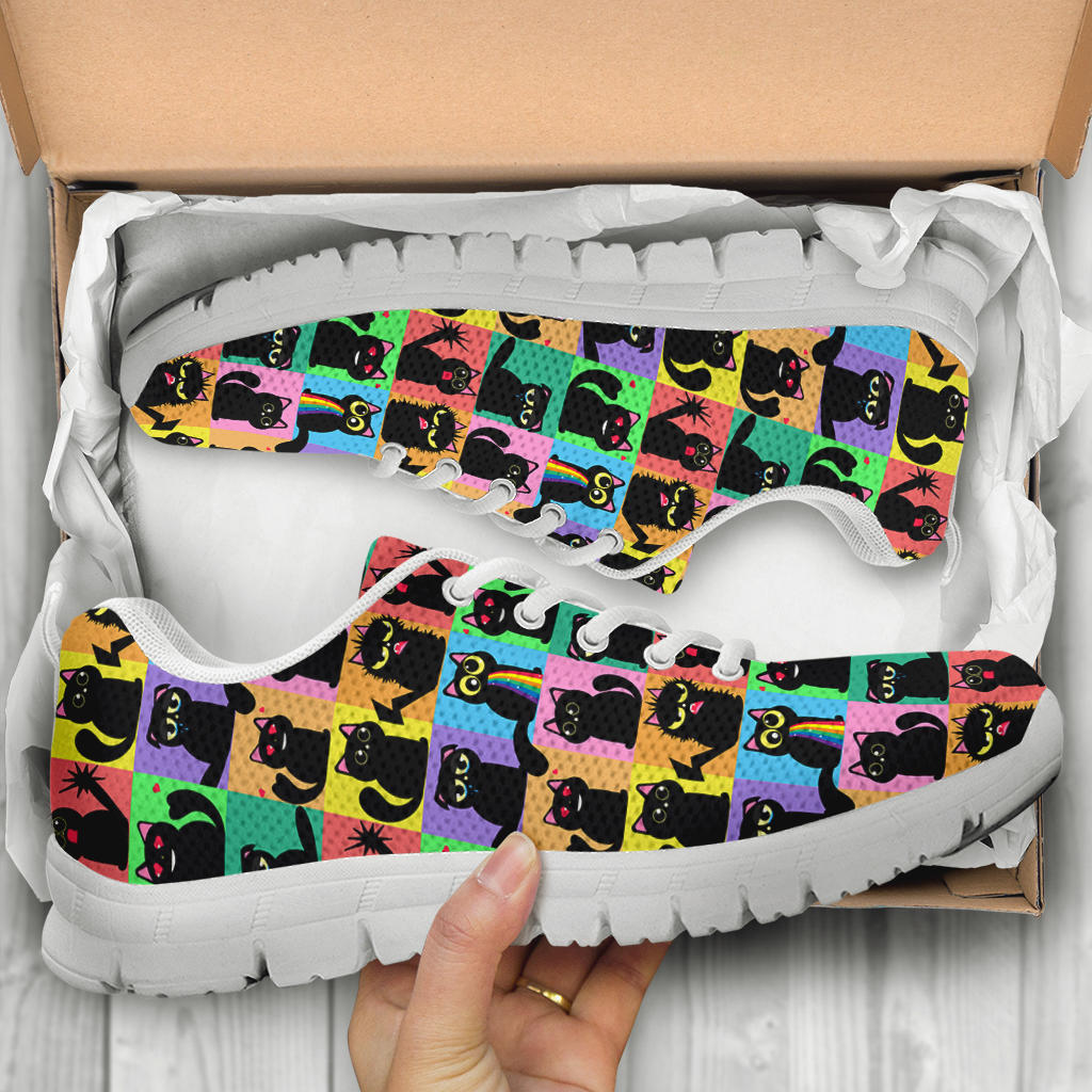 Unboxing Black Cats Classic Sneakers with white soles, showing the playfully printed shoes inside the packaging.