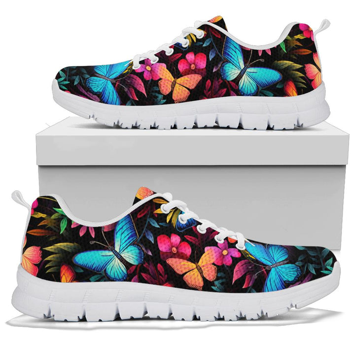 A pair of Butterflies Sneakers with white soles and white laces, displayed resting on top of a plain white shoe box.