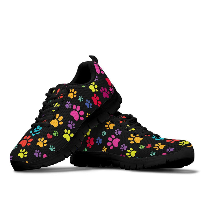 Colorful Paws Sneakers featuring a playful multi-colored paw print pattern on black background with black soles.