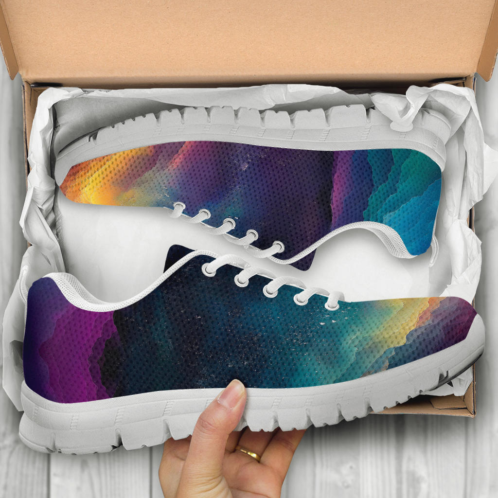 Unboxing Colorful Universe Sneakers with white soles, showing the vibrant cosmic shoes inside a cardboard shoe box.