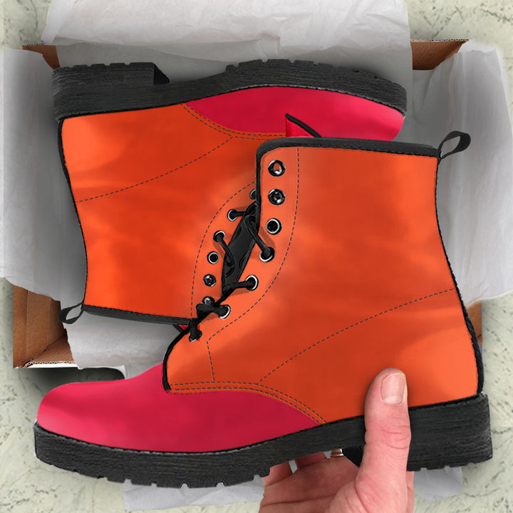 Unboxing Colors Of The Rainbow Classic Boots, showing the boldly colorful boots inside a cardboard shoe box.