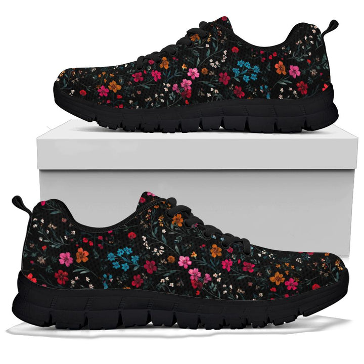 A pair of Floral Sneakers with black soles and black laces, displayed resting on top of a plain white shoe box.