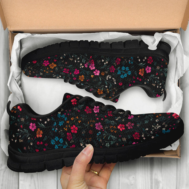 Unboxing Floral Sneakers with black soles, showing the vibrant flower patterned shoes inside a cardboard box.
