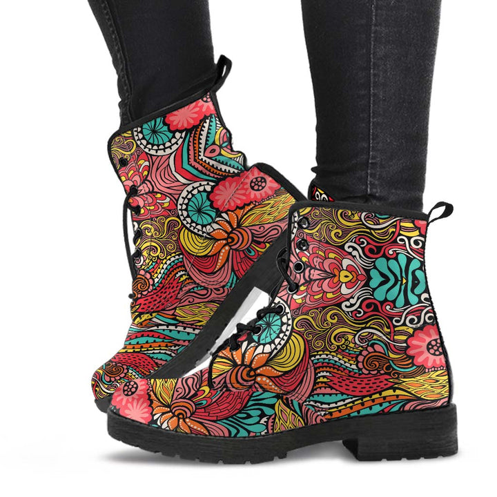 Lifestyle shot of Happy Day Classic Boots worn on feet, highlighting the bright and fun pattern.