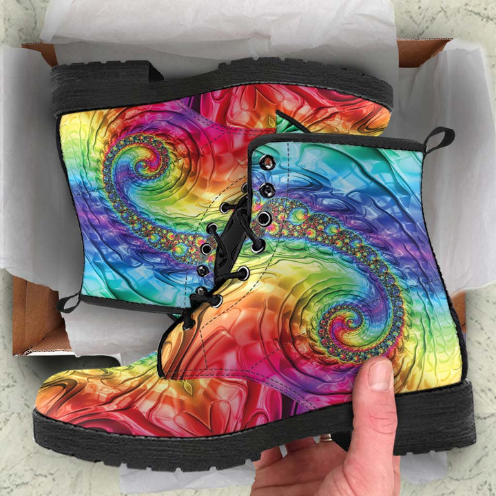 Unboxing the Happy Rainbow Classic Boots, showing the vibrantly printed boots resting inside the cardboard packaging.