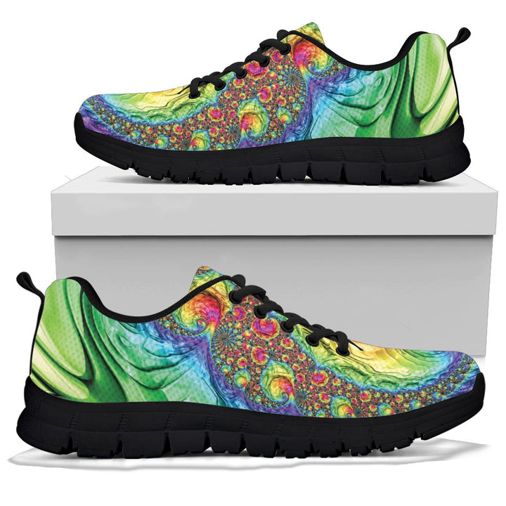 Happy Rainbow Classic Sneakers with black soles resting on a shoe box, highlighting the bold tie-dye art work.