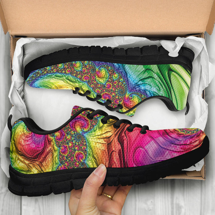 Unboxing Happy Rainbow Classic Sneakers with black soles, showing the vibrant tie-dye design inside a cardboard box.