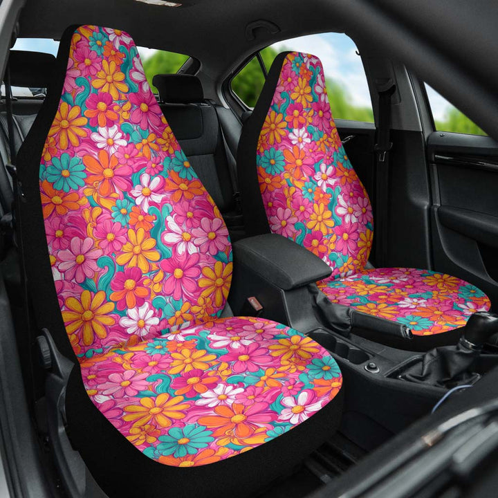 Front angled view of both Hippie Floral Car Seat Covers installed in a car, adding a joyful 70s touch to the interior.
