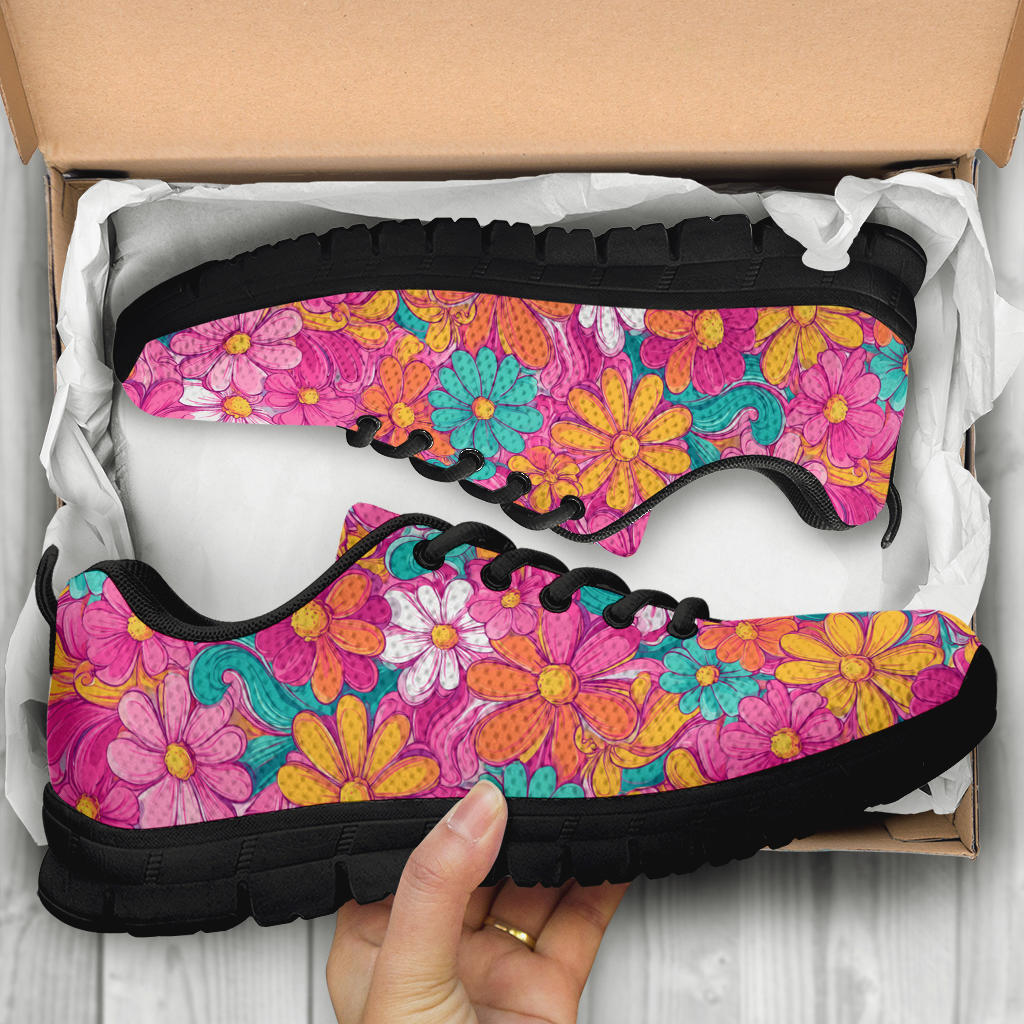 Unboxing Hippie Floral Sneakers with black soles, showing the pink beautiful flower themed shoes inside a cardboard box.