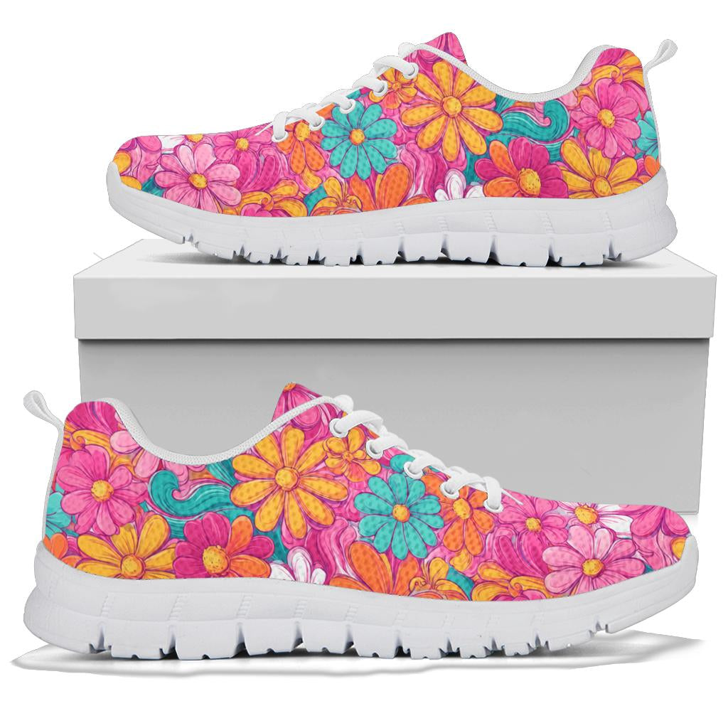 A pair of Hippie Floral Sneakers with white soles and white laces, displayed resting on top of a plain white shoe box.