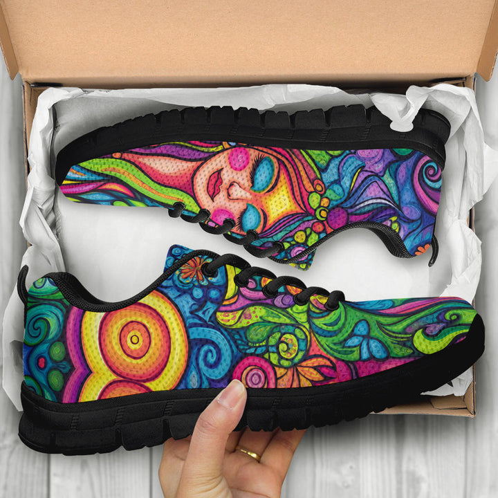 Unboxing Hippie Vibes Sneakers with black soles, showing the colorful shoes held inside a cardboard shoe box.