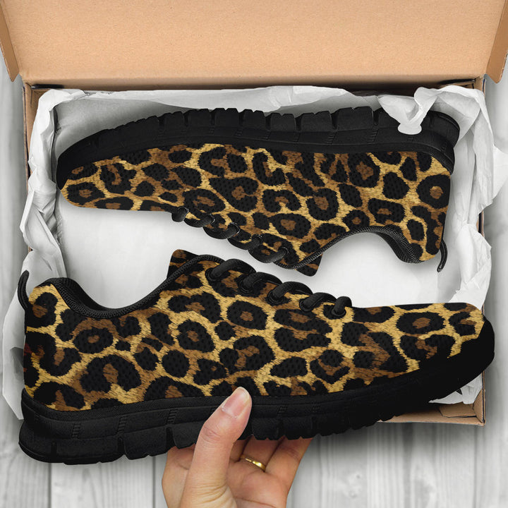 Unboxing Leopard Sneakers with black soles, showing the animal print themed shoes inside a cardboard box.