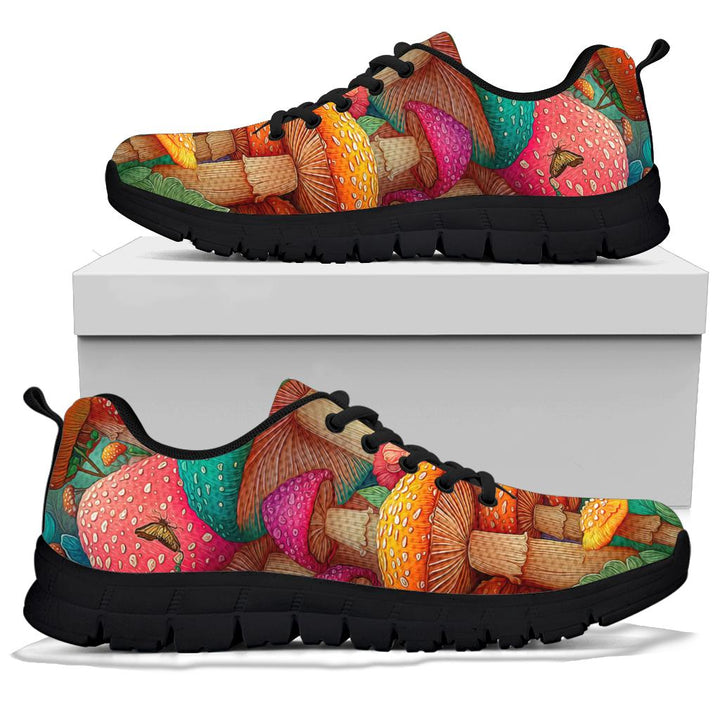 A pair of Magic Mushrooms Sneakers with black soles and black laces, displayed resting on top of a plain white shoe box.