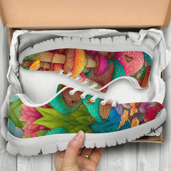 Top-down view of Magic Mushrooms Sneakers with white soles inside their packaging.