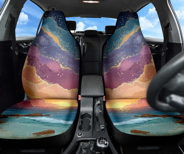 Magical Sunset Car Seat Covers installed on front seats, showing the stunning colorful ocean and sky artwork.