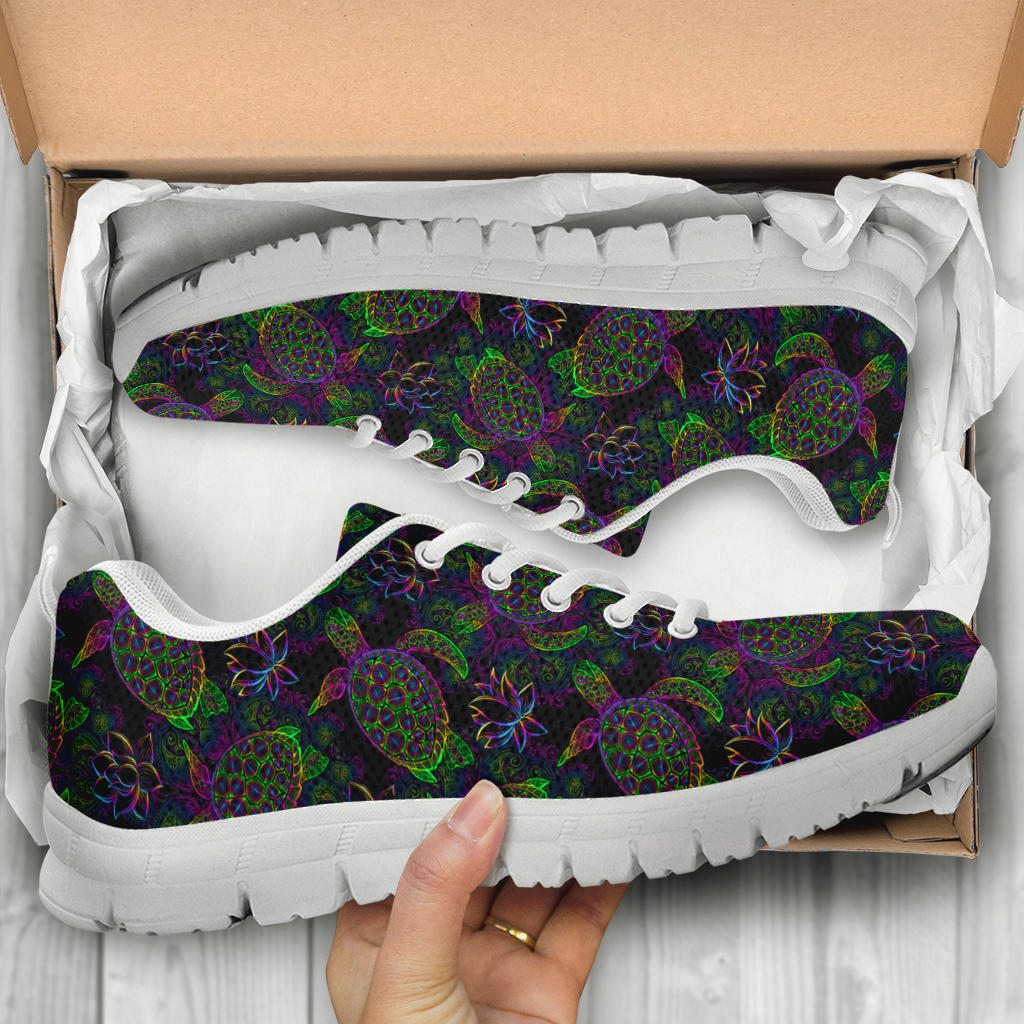 Unboxing Sea Turtle Sneakers with white soles, showing the vibrant colorful shoes inside a cardboard shoe box.