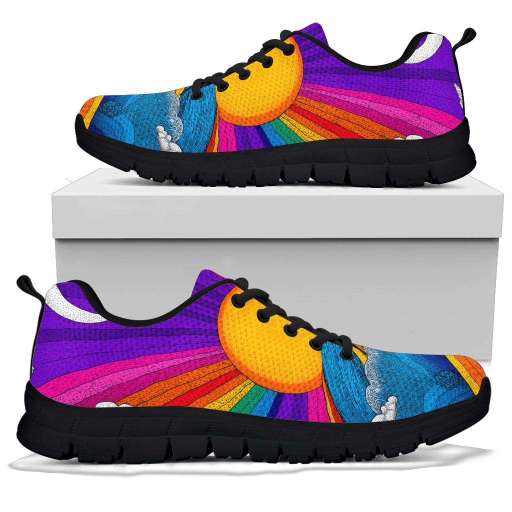 A pair of Trippy Day Sneakers with black soles and black laces, displayed resting on top of a plain white shoe box.