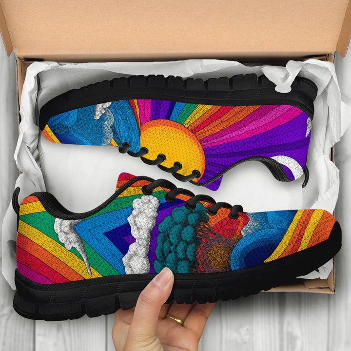 Unboxing Trippy Day Sneakers with black soles, showing the sun and rainbow themed shoes inside a cardboard box.
