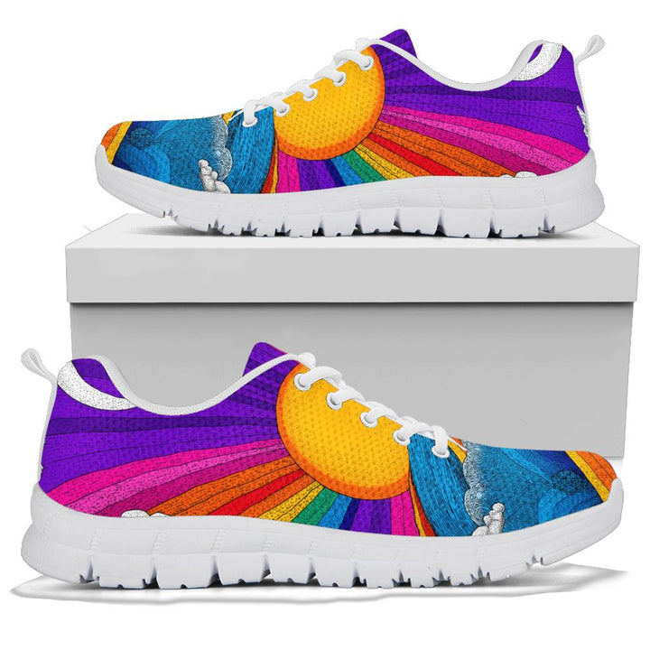 A pair of Trippy Day Sneakers with white soles and white laces, displayed resting on top of a plain white shoe box.