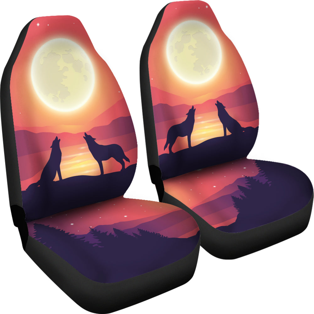 Angled view of a pair of Wolves Car Seat Covers showcasing the howling wolves and sunset design.